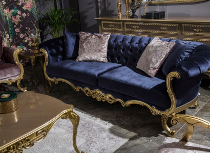 Chesterfield three-seater sofa in a luxurious blue color for the living room
